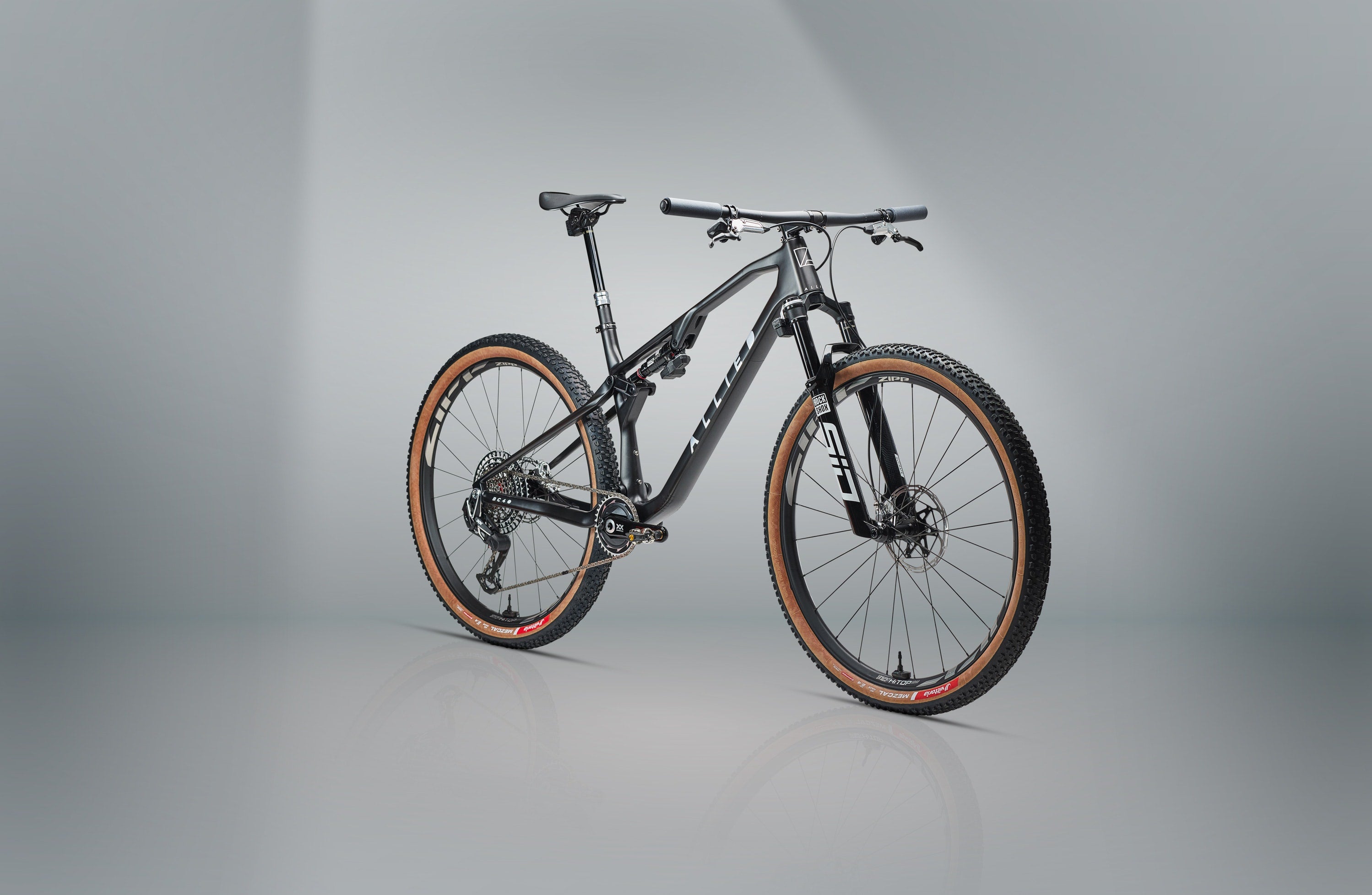 Mountain bike on a gray background