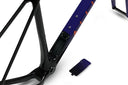 ALLIED ABLE Last Light down tube with the in-frame storage hatch open and its purple-fade cover set beside it, near the bottom bracket