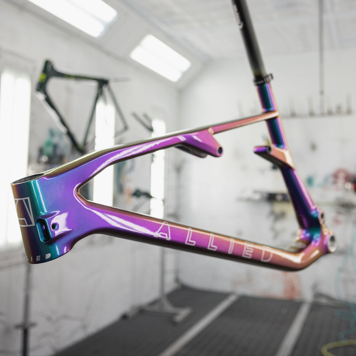 ALLIED BC40 custom painted frameset harlequin purple to green in ALLIED paint booth